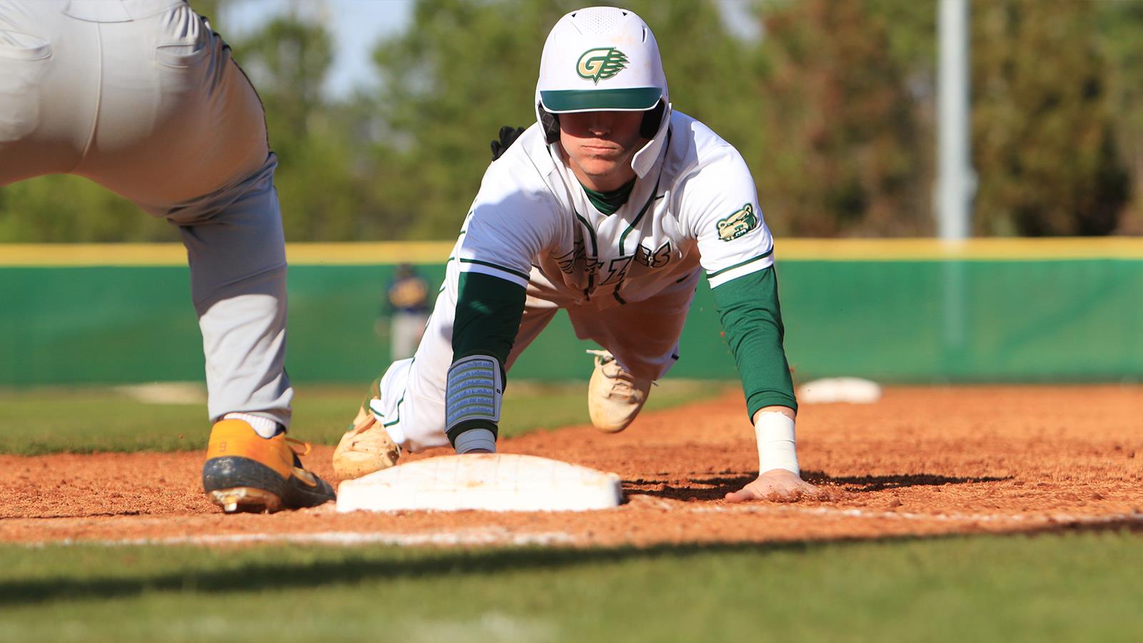 Kyle Harvey diving back to base at Georgia Gwinnett College
